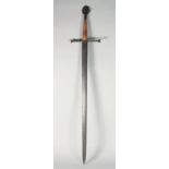 A LARGE HAND AND A HALF BROAD SWORD with cruciform hilt. Tolodo blade.