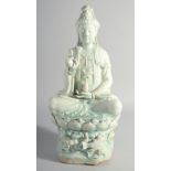 A LARGE CHINESE YINGQING GLAZE QUANYIN seated upon a lotus throne, 45cm high.