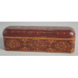 A TURKISH ISLAMIC PEN BOX, with floral decoration, 27.5cm long.