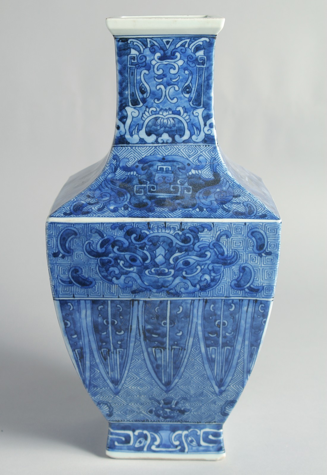 A LARGE CHINESE BLUE AND WHITE PORCELAIN SQUARE FORM VASE, the base with six-character mark, 35cm