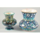 TWO IZNIK STYLE PALESTINIAN JERUSALEM VASES, 13.5cm and 11.5cm high.