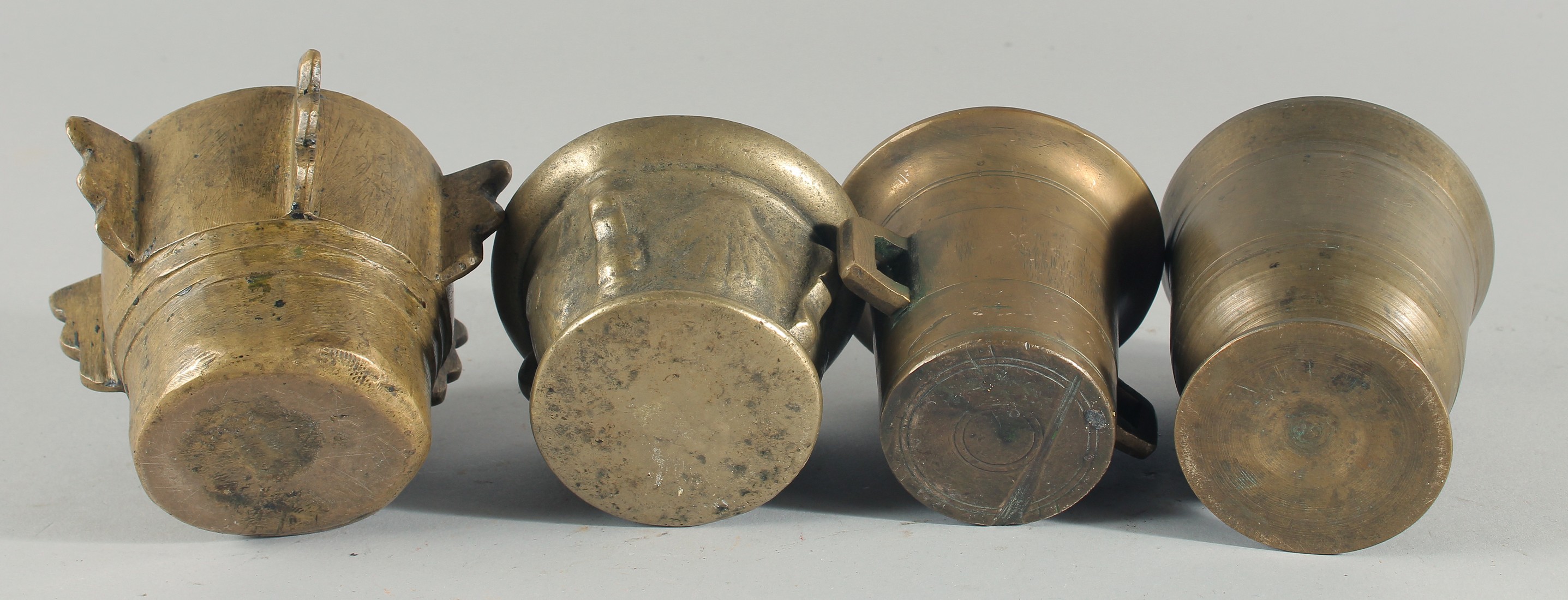 A COLLECTION OF FOUR BRONZE PESTLE AND MORTARS, (eight pieces). - Image 5 of 5