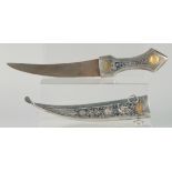 A FINE EARLY 20TH CENTURY IRAQI NIELLO AND GOLD INLAID SILVER DAGGER, 35cm long.