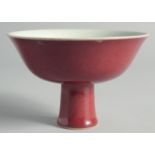 A CHINESE RED GLAZE PEDESTAL BOWL, with six-character mark to inner foot rim, bowl 15cm diameter.
