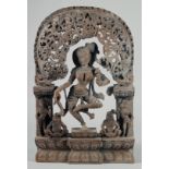 A FINE 19TH-20TH CENTURY INDIAN CARVED WOODEN GROUP, depicting a central dancing figure, 49cm x