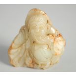 A CHINESE CARVED JADE FIGURE OF AN IMMORTAL, 7.5cm high.