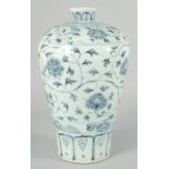 A CHINESE BLUE AND WHITE PORCELAIN MEIPING VASE, decorated with flower heads and scrolling vine,