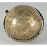 A FINE ISLAMIC ENGRAVED BRASS CELESTIAL GLOBE, 12cm diameter.