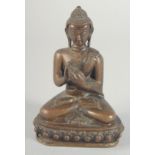 A BRONZE FIGURE OF A SEATED BUDDHA, 14cm high.