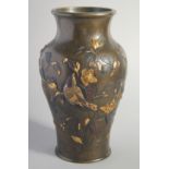 A SUPERB JAPANESE MIXED METAL OVERLAID BRONZE VASE, with gilded decoration depicting a bird
