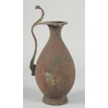 AN EARLY ABBASID OR UMAYYAD EWER, 32.5cm high.