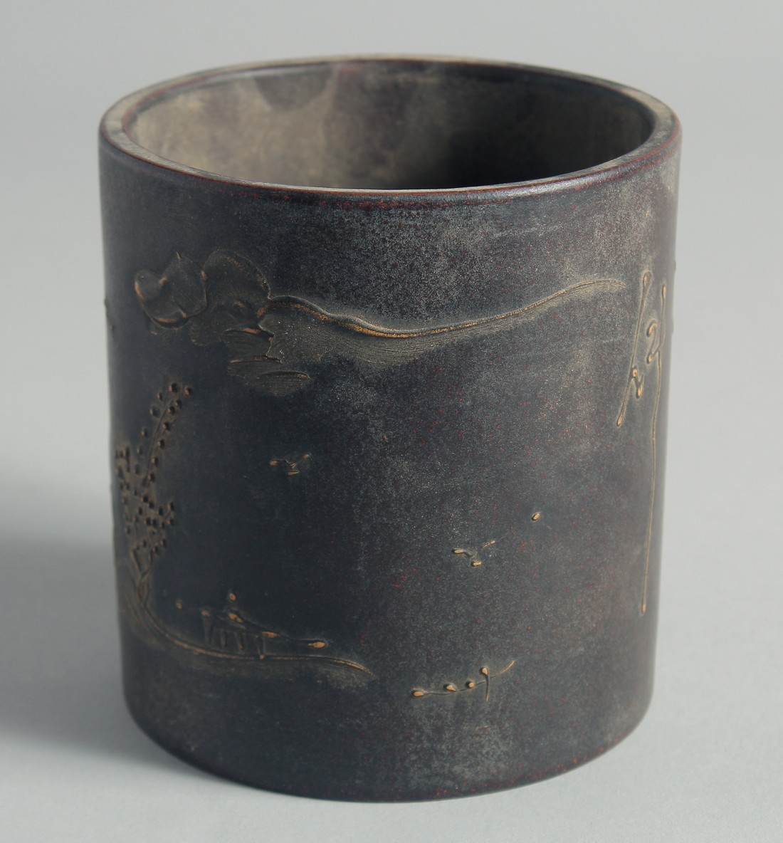 A CHINESE YIXING CYLINDRICAL BRUSH POT, with character mark to base, 11.5cm high