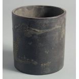 A CHINESE YIXING CYLINDRICAL BRUSH POT, with character mark to base, 11.5cm high