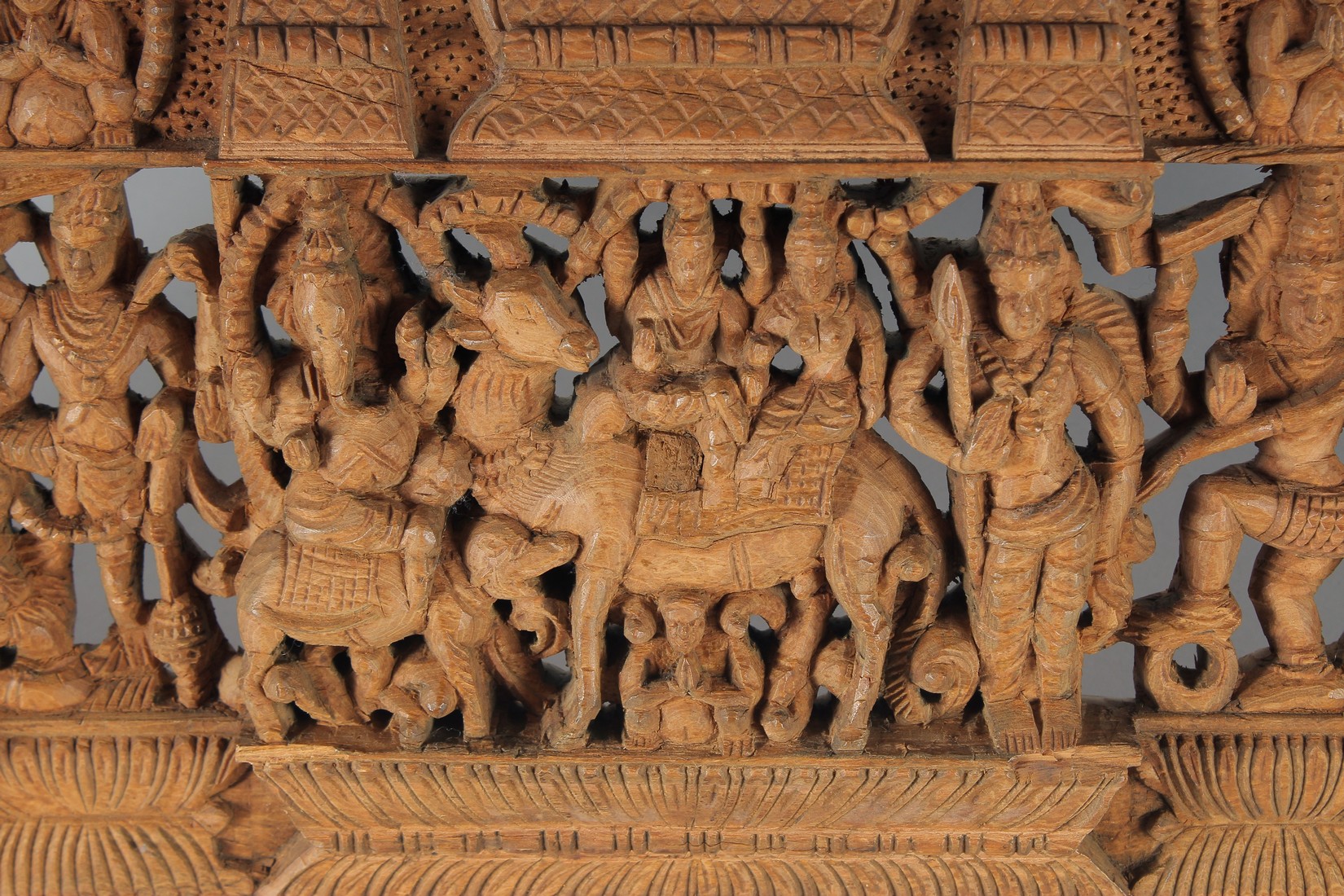 A THAI CARVED AND PIERCED RECTANGULAR WOODEN PANEL, depicting deities, animals and musicians, 73cm x - Bild 3 aus 4