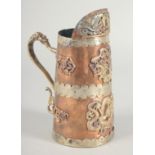 A CHINESE COPPER AND BRASS JUG, with applied dragons, 19cm high.