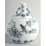 A CHINESE MING STYLE BLUE AND WHITE PORCELAIN MOON FLASK, each side paint with a bird on a branch,