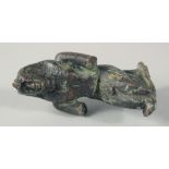 A SMALL EARLY EGYPTIAN BRONZE FIGURE, 6.5cm high.