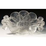 A MUGHAL INDIAN CARVED ROCK CRYSTAL CUP, with floral twin handles and carved flower motif to the