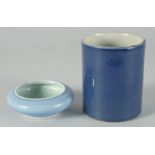 A CHINESE POWDER BLUE PORCELAIN BRUSH WASHER, the base with six-character mark, 10cm diameter,