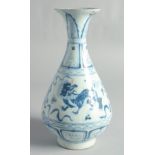 A CHINESE BLUE AND WHITE YUHUCHUN VASE, painted with foo dogs, 30cm high.