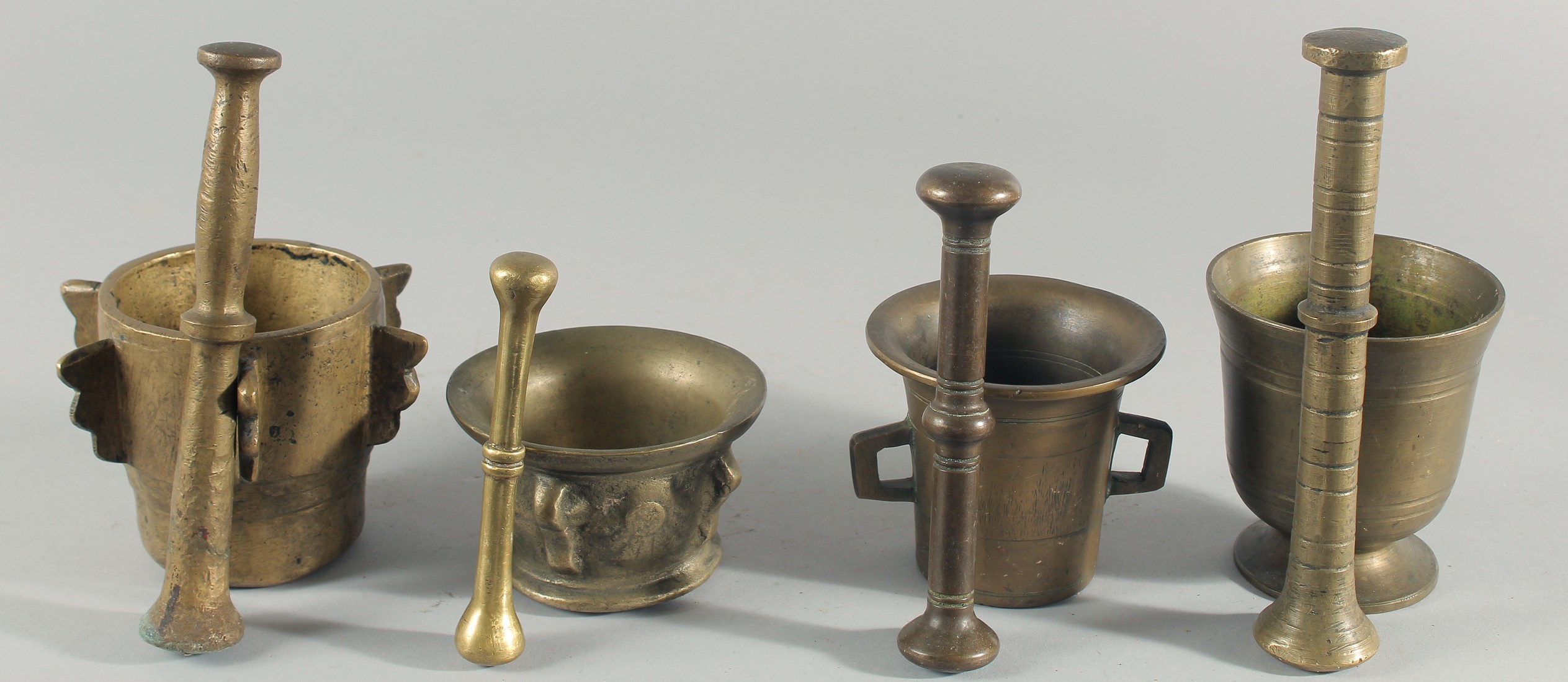 A COLLECTION OF FOUR BRONZE PESTLE AND MORTARS, (eight pieces). - Image 2 of 5