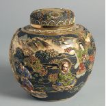 A JAPANESE SATSUMA JAR AND COVER, relief decorated with figures in a landscape scene and further