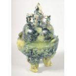 A CHINESE MARBLED GREEN SOAPSTONE TRIPOD LIDDED CENSER, 17cm high.