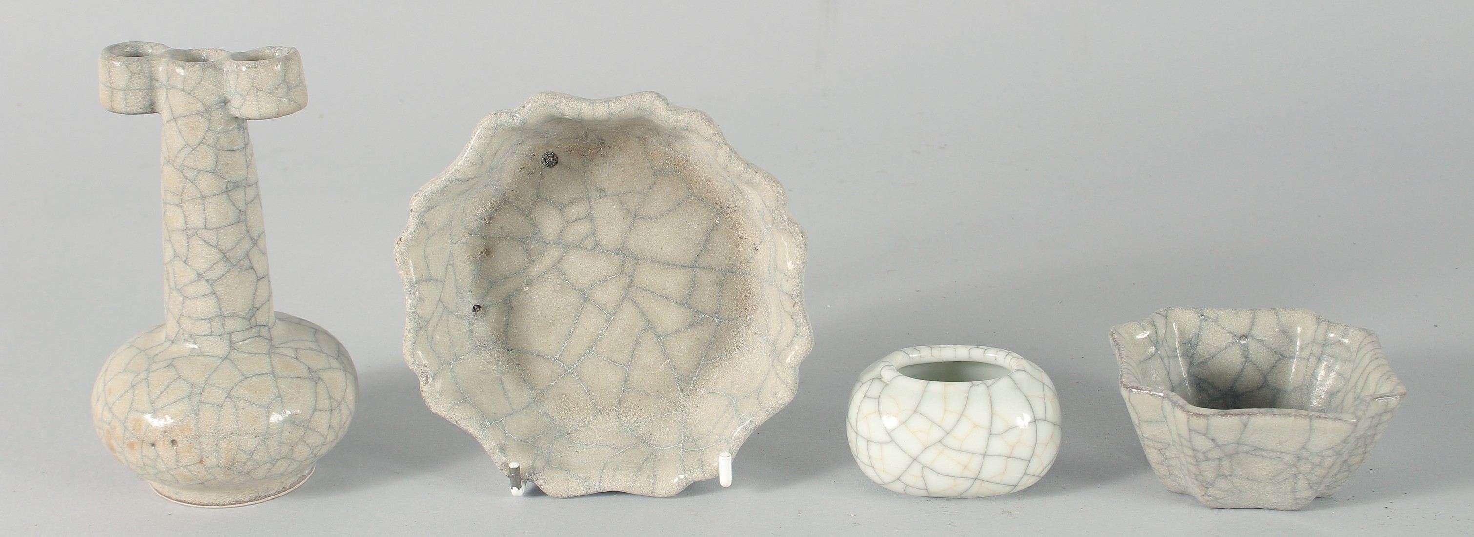 A COLLECTION OF FOUR CHINESE CRACKLE GLAZE ITEMS, comprising a small vase, a bowl, a brush wash