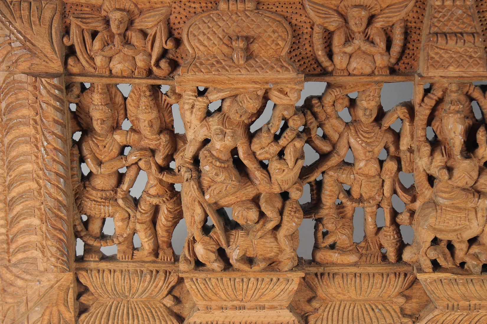 A THAI CARVED AND PIERCED RECTANGULAR WOODEN PANEL, depicting deities, animals and musicians, 73cm x - Bild 2 aus 4