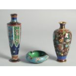TWO SMALL JAPANESE CLOISONNE VASES, each decorated with floral motifs, 18cm and 15.5cm, together