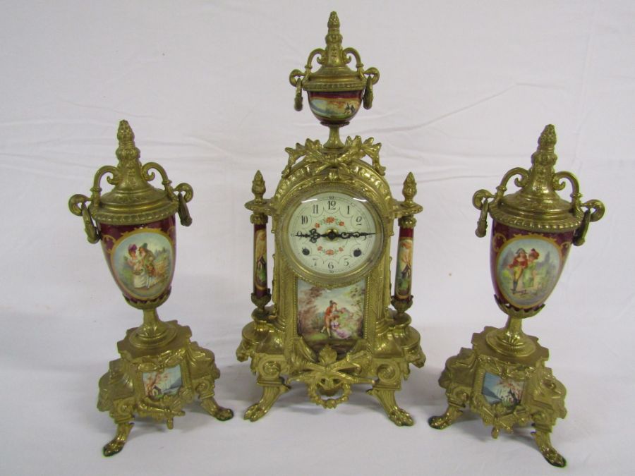 20th century French style gilt metal and porcelain clock garniture - the clock having German