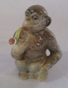 Beswick monkey smoking a pipe no 1049 H 12 cm