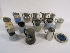 Collection of pewter lidded jugs and others