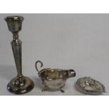 Silver candlestick with loaded base Sheffield 1972  A T Cannon Ltd, silver sauce boat Birmingham