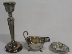 Silver candlestick with loaded base Sheffield 1972  A T Cannon Ltd, silver sauce boat Birmingham