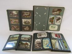 Collection of vintage postcard albums with postcards, places and pictures, mostly written on, the