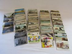 Large collection of vintage postcards, some local, some metal, most have been written on