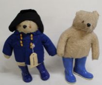 2 Gabrielle Paddington bears, 1 with blue duffle coat and hat, both wearing later wellington boots
