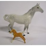 Beswick dapple horse with swish tale and Beswick Palomino foal