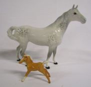 Beswick dapple horse with swish tale and Beswick Palomino foal