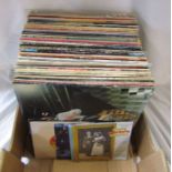 Mixed selection of vinyl LP records - includes The Beatles, David Bowie, Fleetwood Mac etc