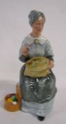 Royal Doulton 'Embroidering' figurine from the Golden Years series