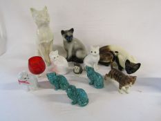 Collection of ceramic cats to include some Coopercraft and a piece of red glass