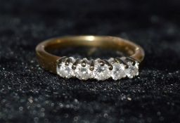 18ct gold 5 stone diamond ring (approximately 0.3 ct total) size O
