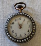Ladies silver gilt, enamel & seed pearl fob watch