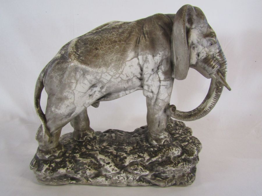 Large early 20th century plaster elephant approx. 17cm x 41cm - Image 5 of 5
