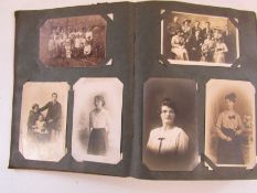 Collection of mostly vintage real photographic postcards, mostly written on, the album may not be