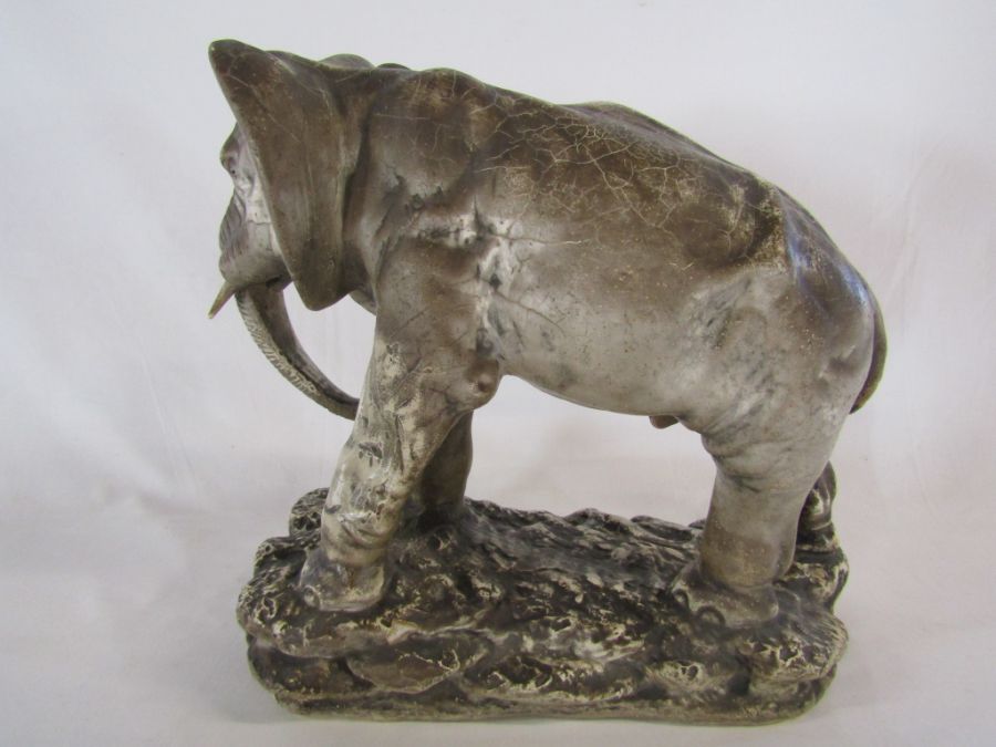 Large early 20th century plaster elephant approx. 17cm x 41cm - Image 3 of 5