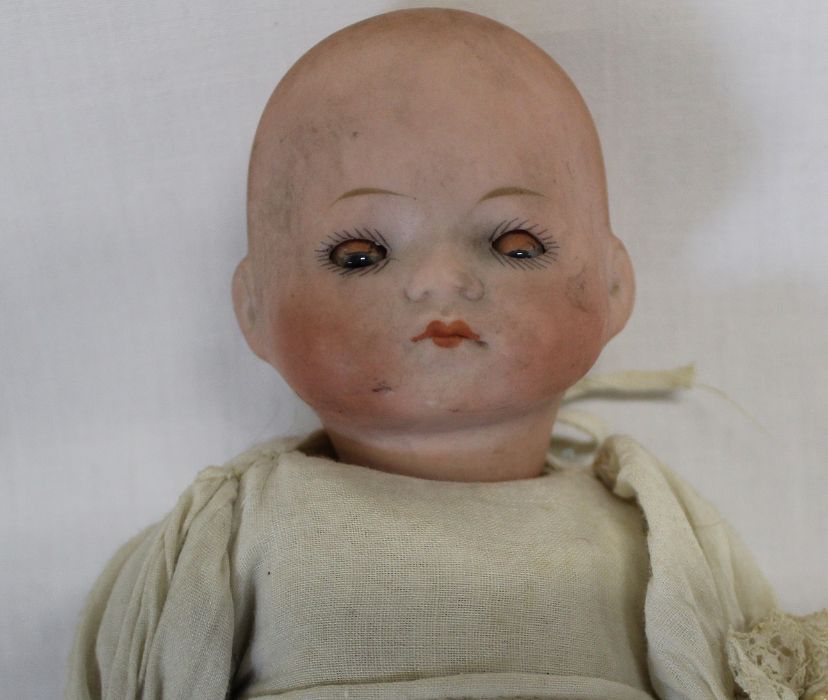 Small bisque head doll marked "UNIS France" on composition straight limb body with fixed eyes, - Image 2 of 12