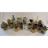 Collection of beer jugs, stoneware carriers and Wade bell bottles - 3 more added (see additional